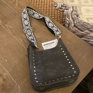 Ahdorned leather purse